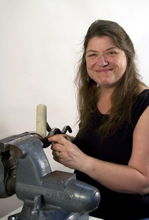 Cynthia Eid Working on a metal piece